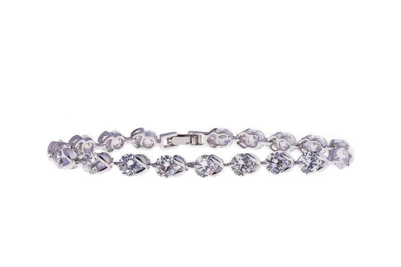 Tennis Bracelet - Embellished with Swarovski crystals and rhodium plated. - One size fits all