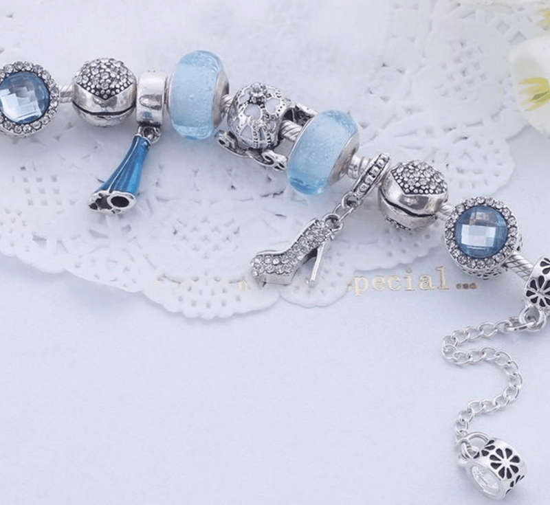 Charming Light Blue and Silver colour bracelet with Fashion themed charms - 21cm