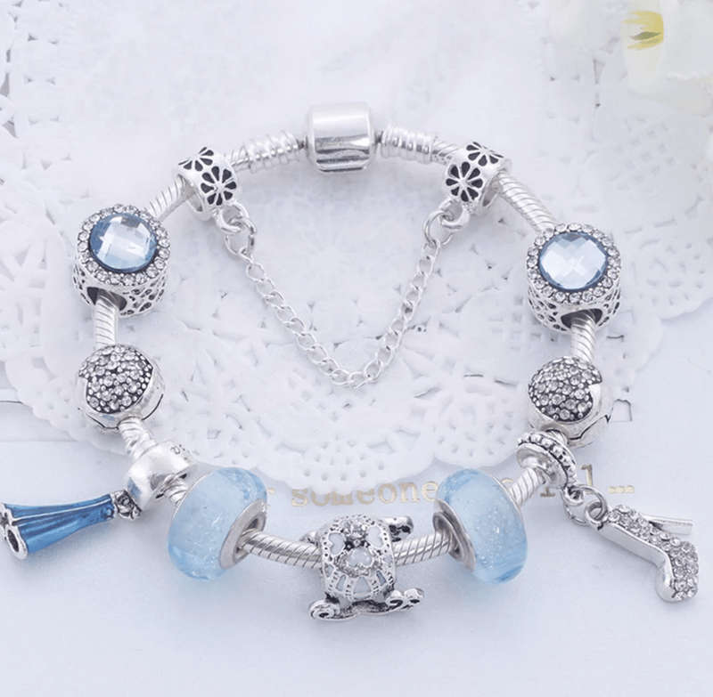Charming Light Blue and Silver colour bracelet with Fashion themed charms - 21cm