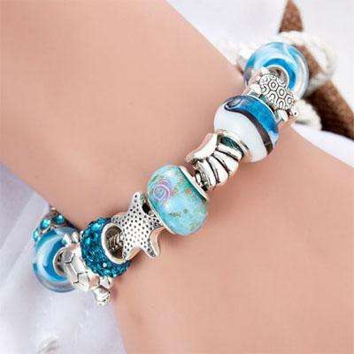 Charming turquoise and silver bracelet with sea-themed charms