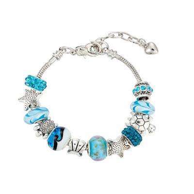 Charming turquoise and silver bracelet with sea-themed charms