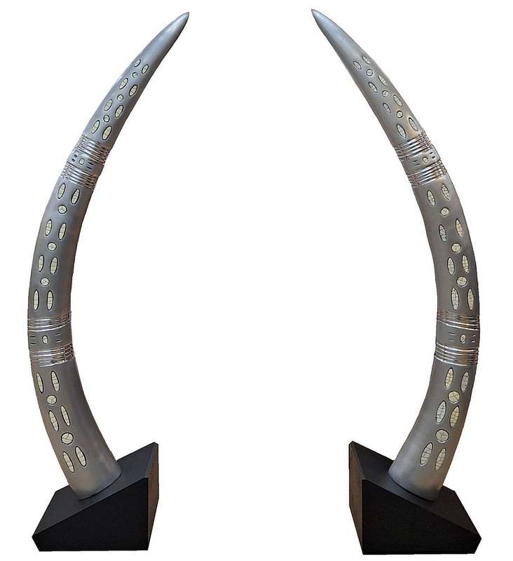 Elephant Aluminium Tusk Pair with Ostrich Eggshell inlay . Mounted on Black wood Stands