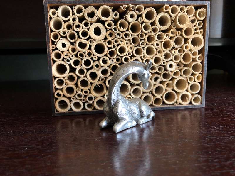 Giraffe Sitting Pewter Sculpture