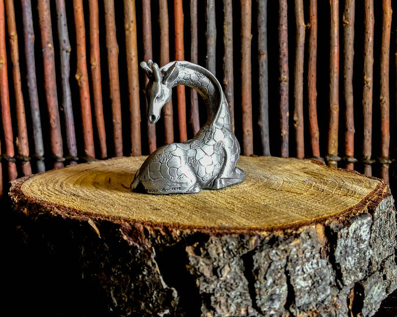 Giraffe Sitting Pewter Sculpture