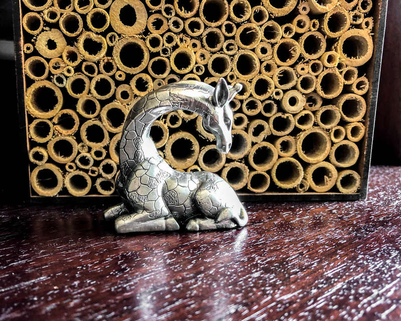 Giraffe Sitting Pewter Sculpture