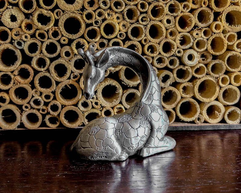 Giraffe Sitting Pewter Sculpture