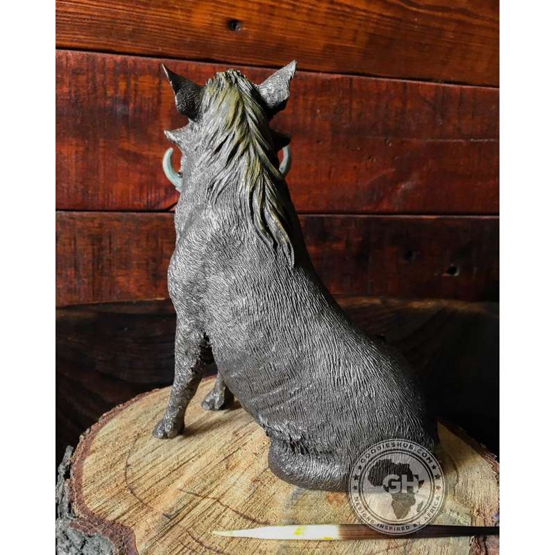 Warthog Sitting Bronzed Sculpture