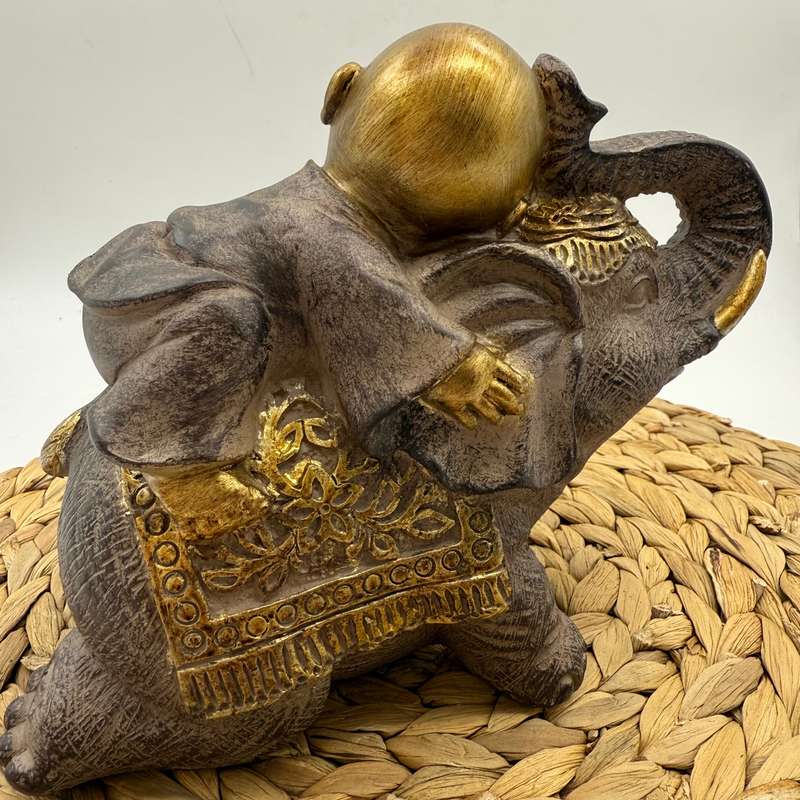 Monk on Elephant Statue (Left facing)