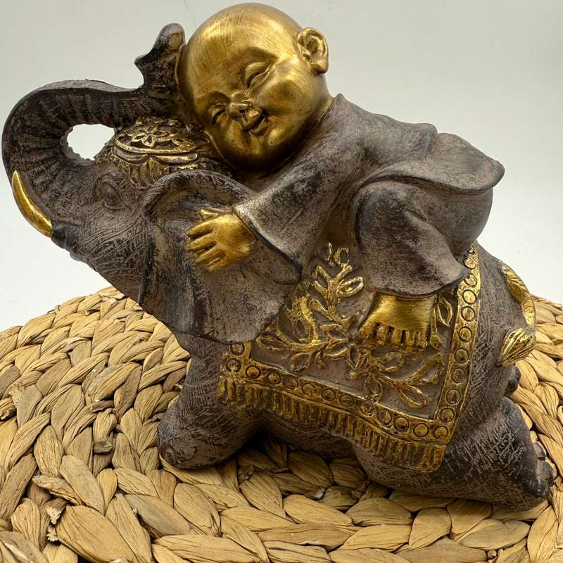 Monk on Elephant Statue (Left facing)