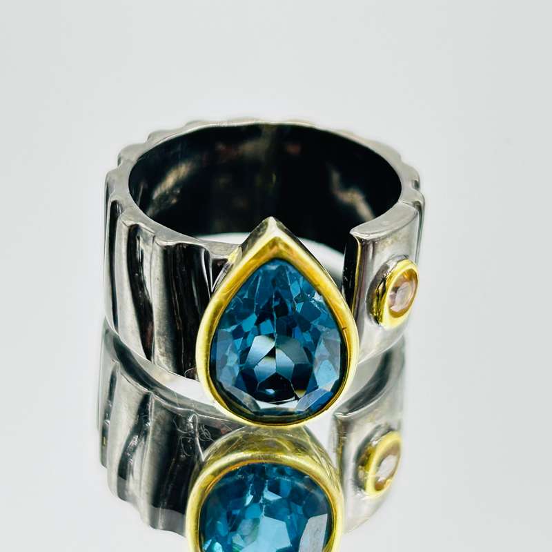 Sterling Silver Rhodium Plated Faceted London Blue Topaz Crystal Ring
