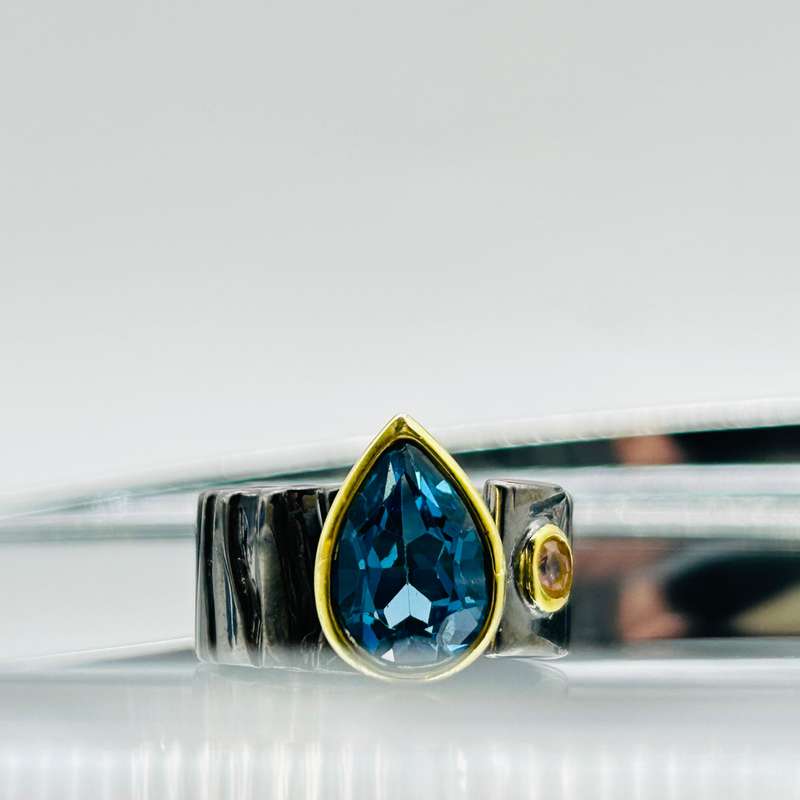 Sterling Silver Rhodium Plated Faceted London Blue Topaz Crystal Ring