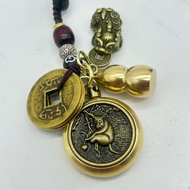Lucky Spinning Coin Keyring -  Monkey