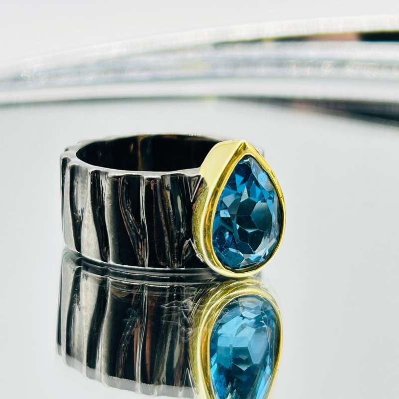 Sterling Silver Rhodium Plated Faceted London Blue Topaz Crystal Ring
