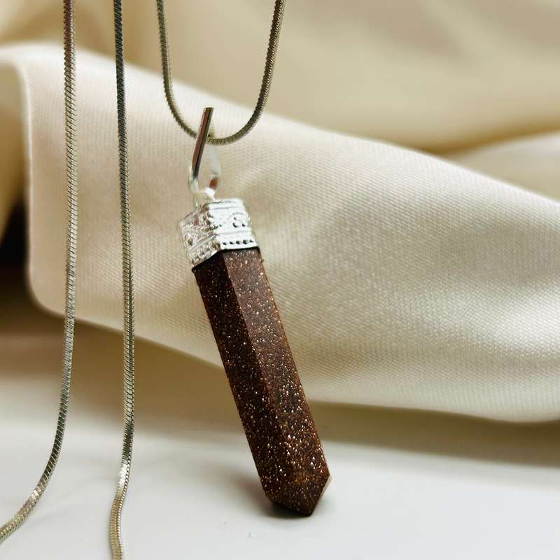 Goldstone White Metal Crystal Pendant