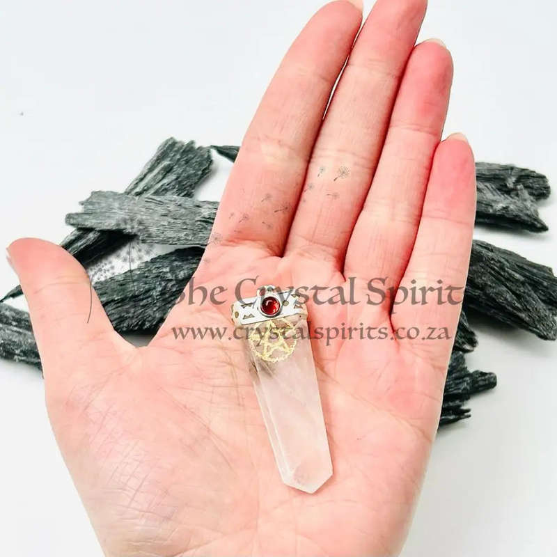 Quartz Pentacle Pendant Encased In White Metal With A Garnet Cabochon