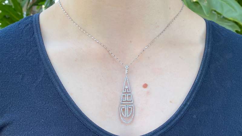 18K gold diamond Art Deco style geometric pendant.