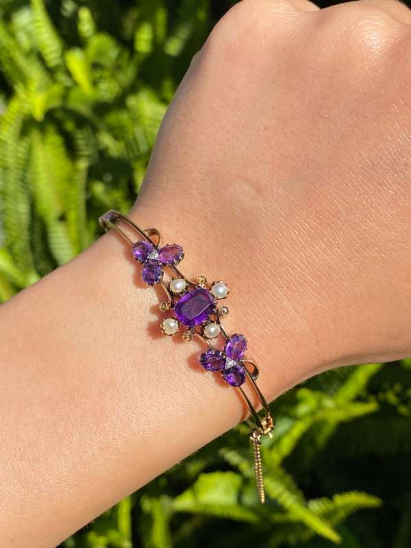 14K gold Edwardian amethyst, pearl, and diamond bangle.