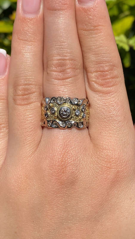 18K gold diamond ring.