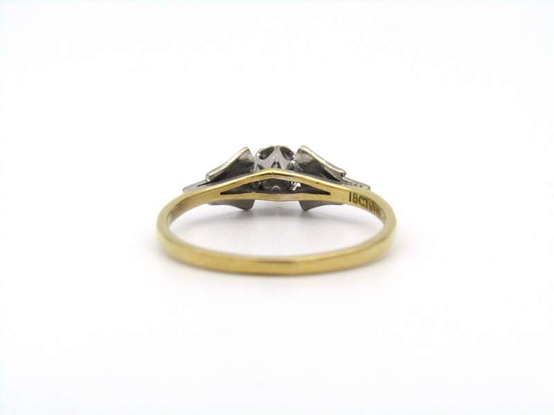 18K gold diamond ring.
