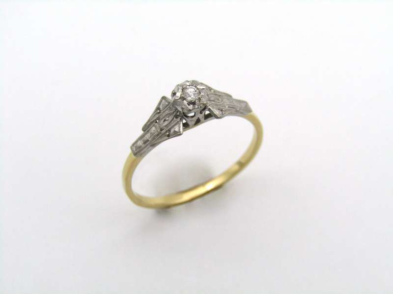 18K gold diamond ring.