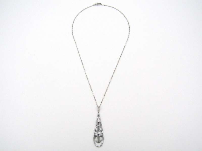 18K gold diamond Art Deco style geometric pendant.