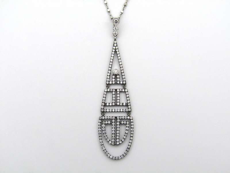 18K gold diamond Art Deco style geometric pendant.