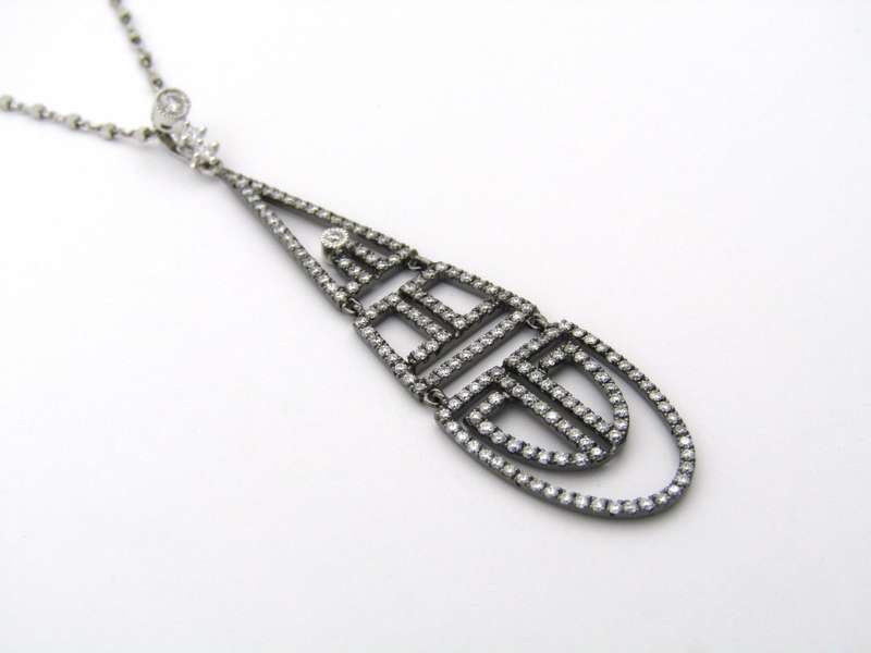 18K gold diamond Art Deco style geometric pendant.