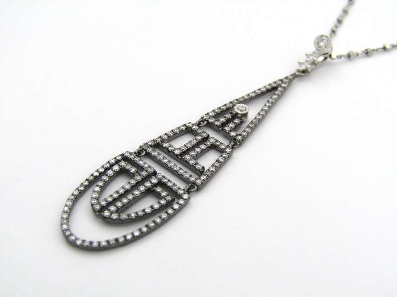 18K gold diamond Art Deco style geometric pendant.