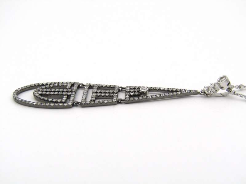 18K gold diamond Art Deco style geometric pendant.