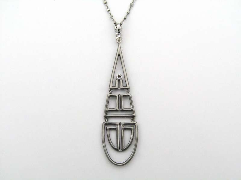 18K gold diamond Art Deco style geometric pendant.