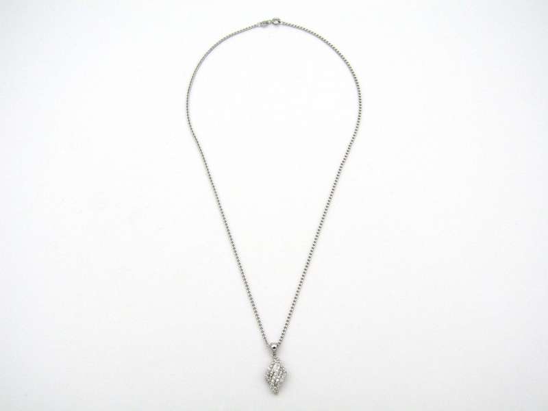 14K gold diamond pendant.
