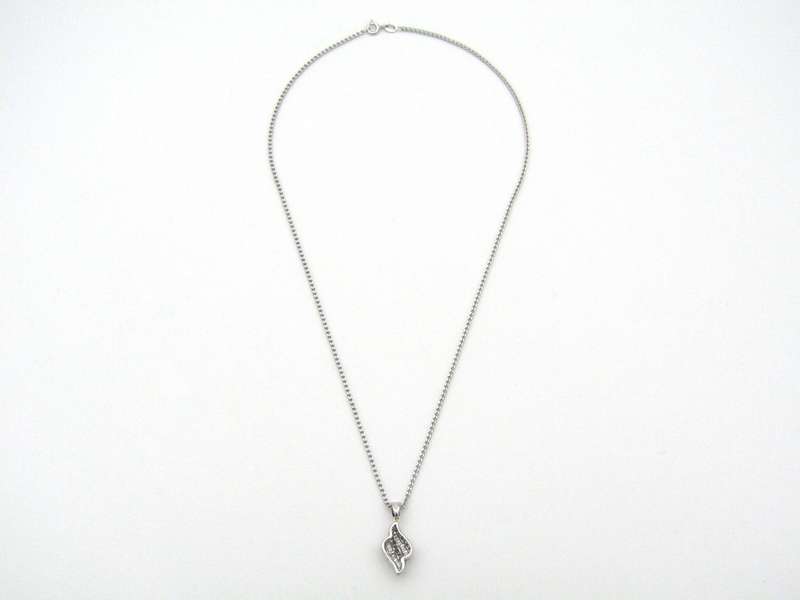 14K gold diamond pendant.