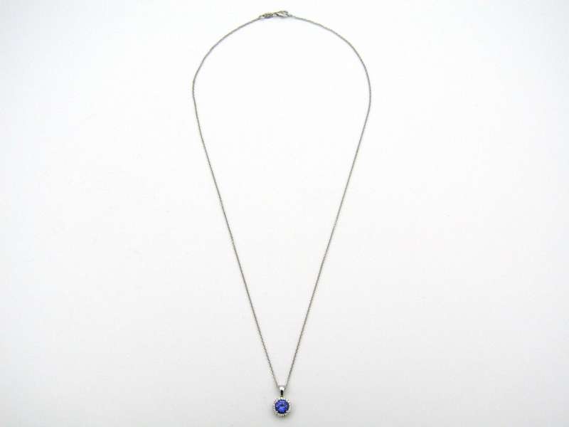 18K gold tanzanite and diamond pendant by Browns.