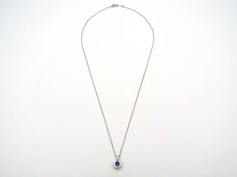 18K gold tanzanite and diamond pendant by Browns.