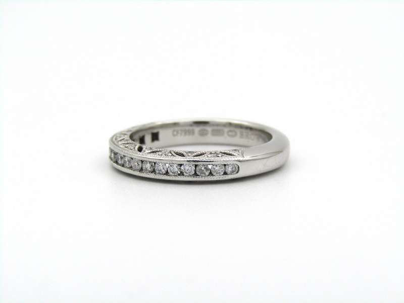 18K gold 1934 half eternity ring by Browns.