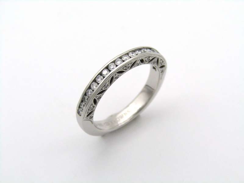 18K gold 1934 half eternity ring by Browns.