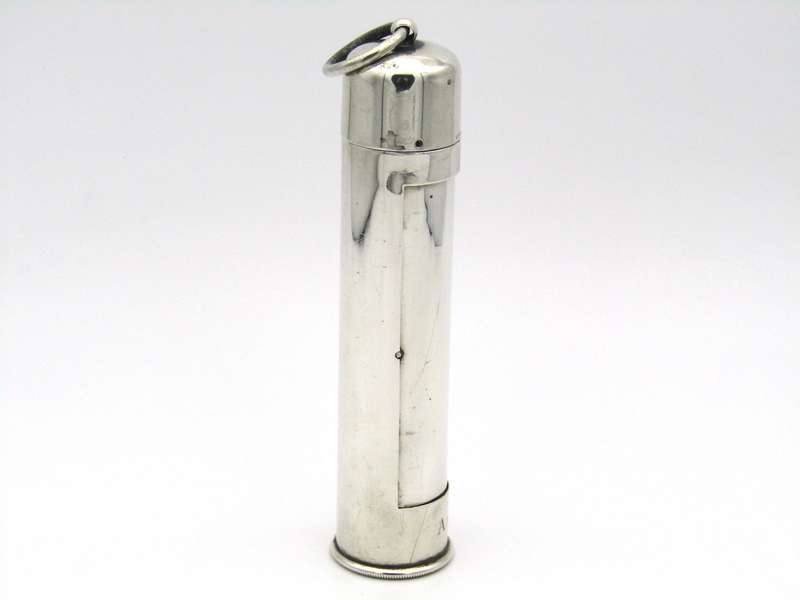 Sterling silver thermometer with swivelling case.