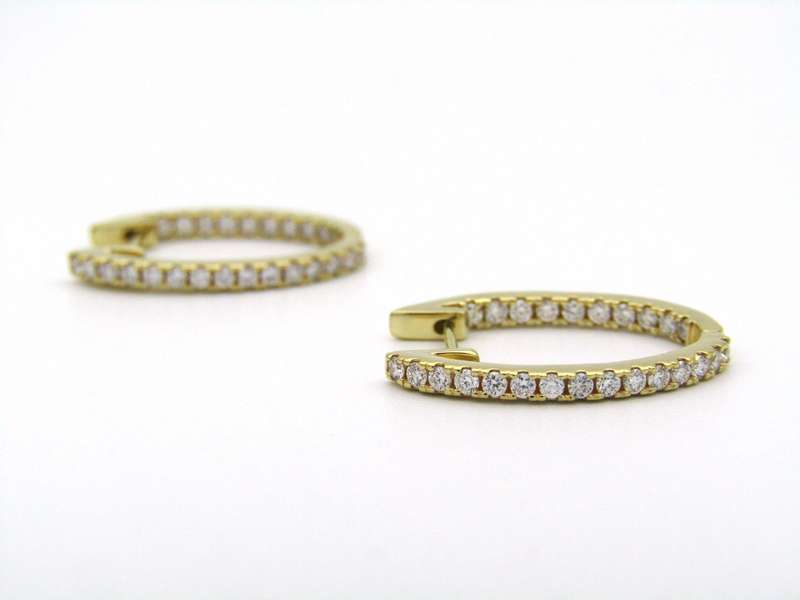 18K gold diamond hoop earrings by Browns.