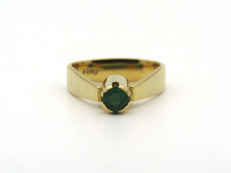 18K gold emerald ring by Erich Frey.