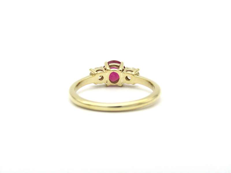 14K gold ruby and diamond trilogy ring.