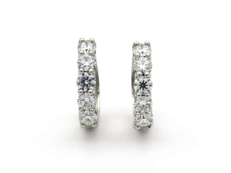 18K gold Diamond Protea huggie earrings by Browns.