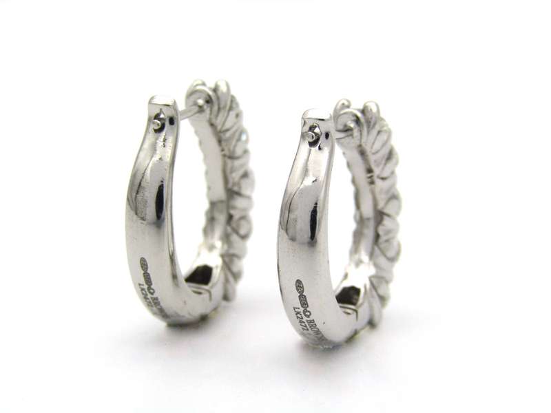 18K gold Diamond Protea huggie earrings by Browns.