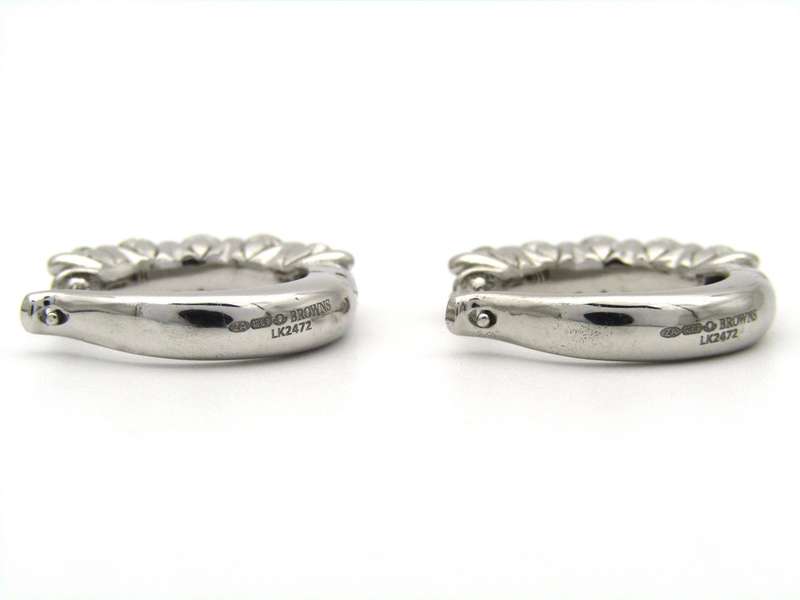 18K gold Diamond Protea huggie earrings by Browns.