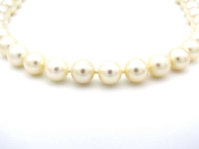18K gold pearl and diamond necklace by Browns.
