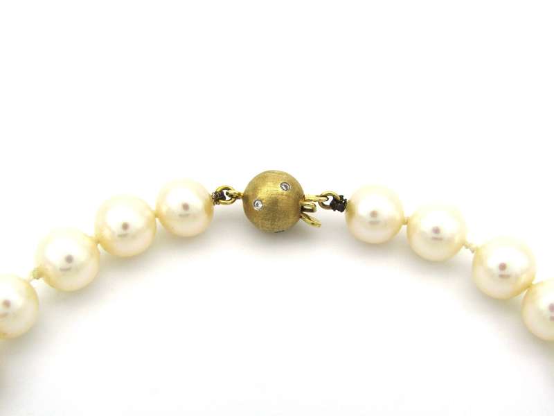 18K gold pearl and diamond necklace by Browns.