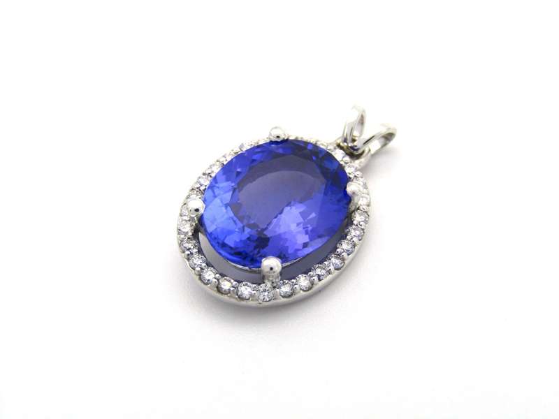 18K gold tanzanite and diamond pendant.
