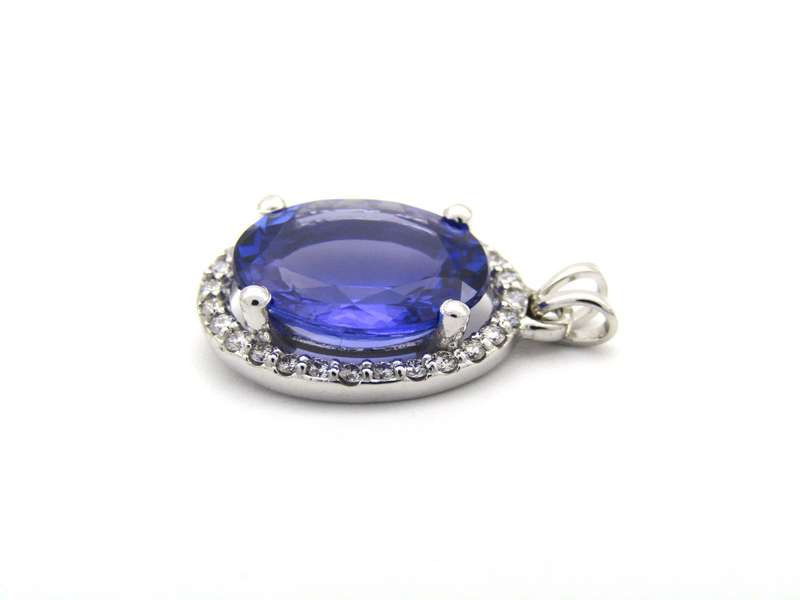 18K gold tanzanite and diamond pendant.