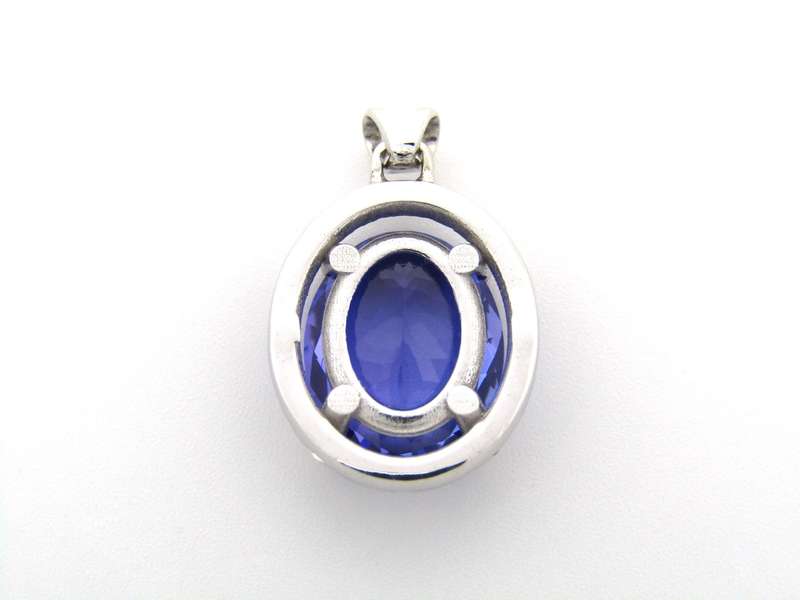 18K gold tanzanite and diamond pendant.