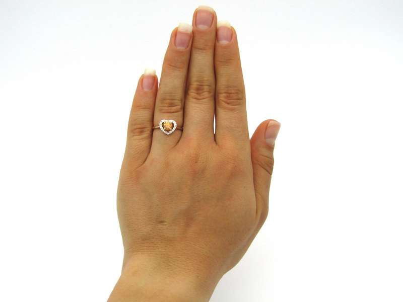 18K gold Orange diamond halo ring.