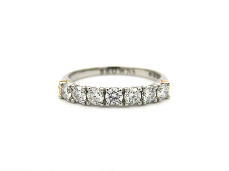 Platinum and 18K gold diamond Protea half eternity ring by Browns.
